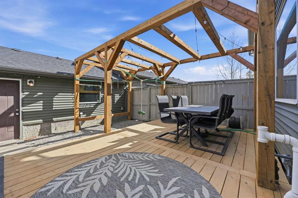 93 Sunvalley Road, Cochrane, AB - Outdoor With Deck Patio Veranda With Exterior