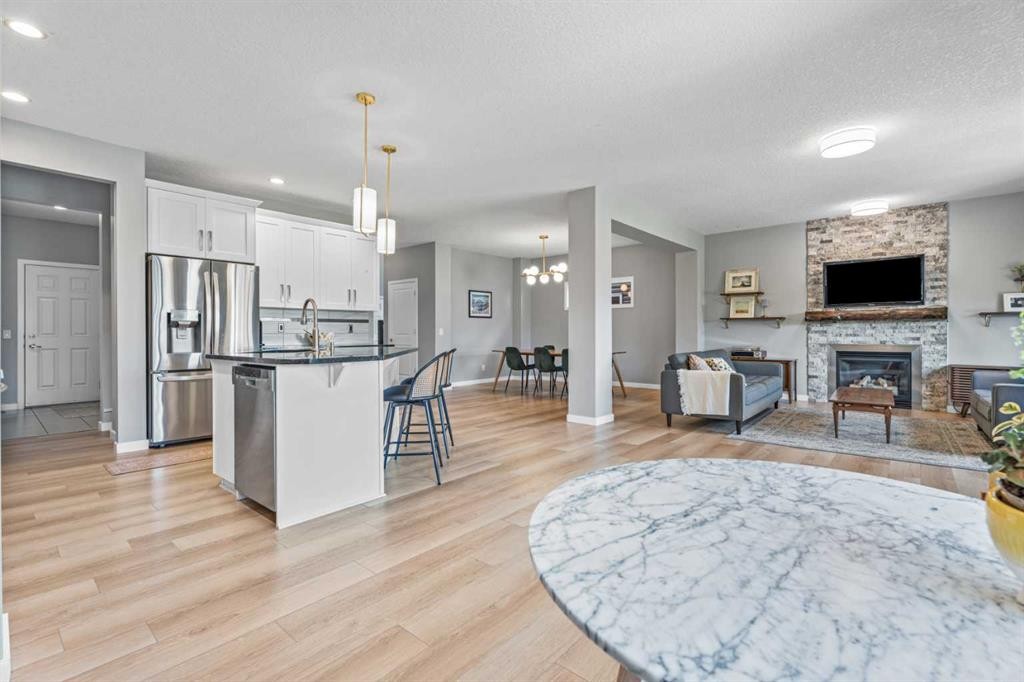 6 Storm Mountain Place, Okotoks, AB - Indoor With Fireplace
