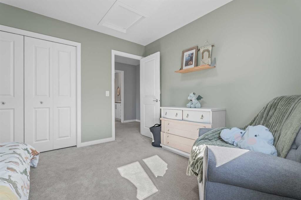 6 Storm Mountain Place, Okotoks, AB - Indoor Photo Showing Bedroom