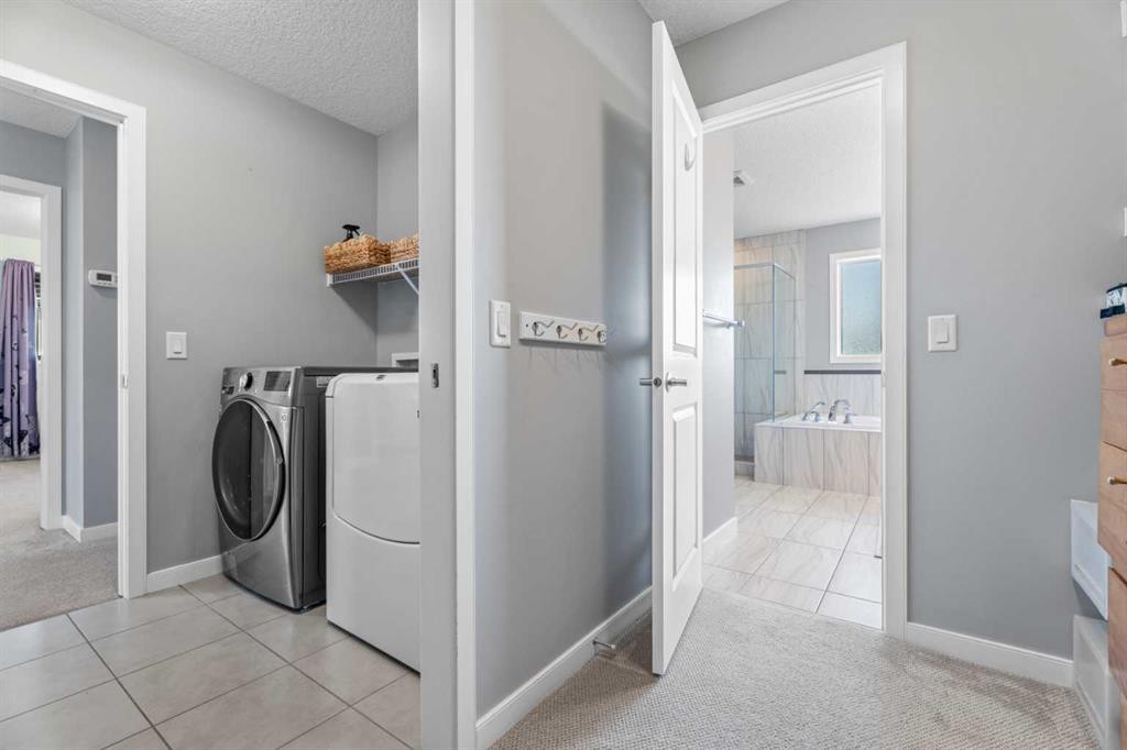 6 Storm Mountain Place, Okotoks, AB - Indoor Photo Showing Laundry Room