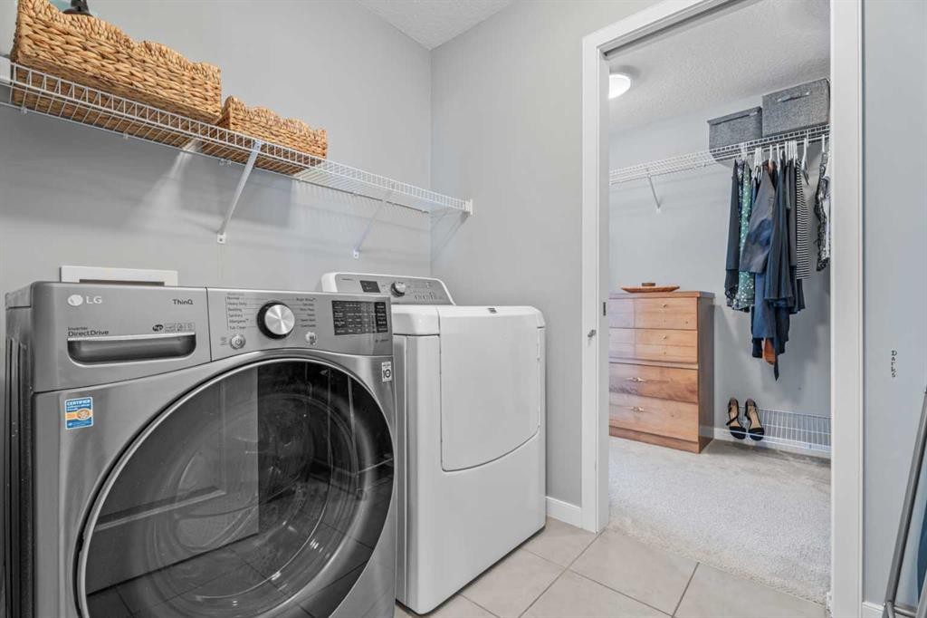 6 Storm Mountain Place, Okotoks, AB - Indoor Photo Showing Laundry Room