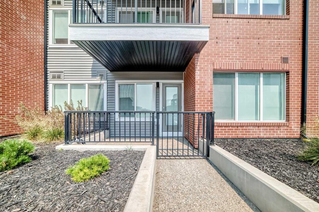 2110-6 Merganser Drive West, Chestermere, AB - Outdoor With Deck Patio Veranda With Exterior