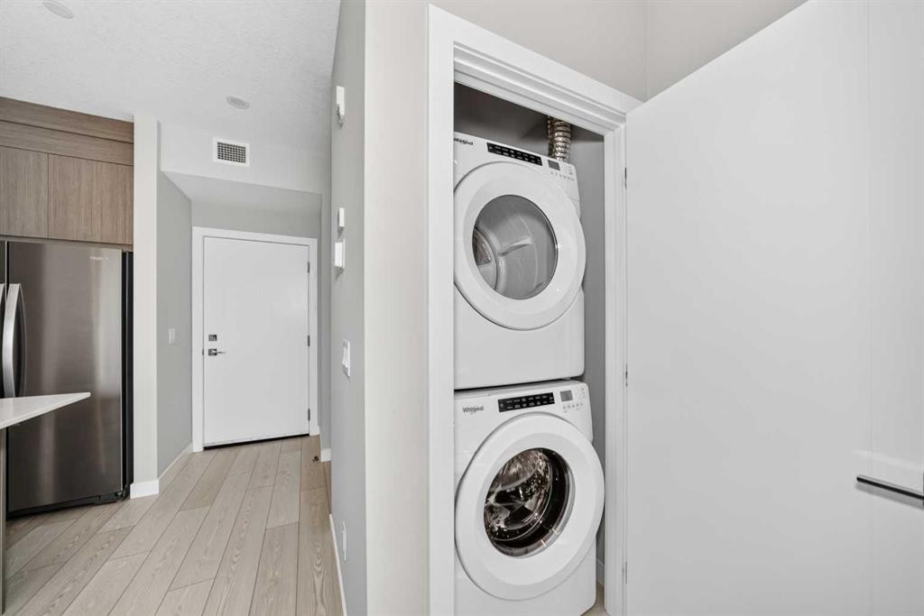 2110-6 Merganser Drive West, Chestermere, AB - Indoor Photo Showing Laundry Room
