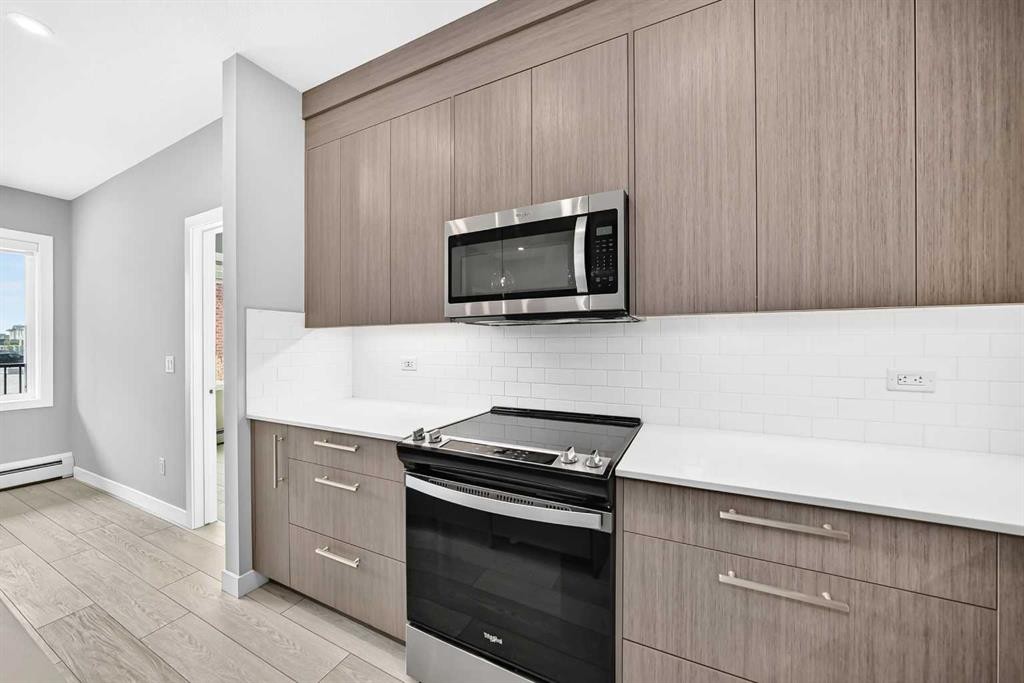 2110-6 Merganser Drive West, Chestermere, AB - Indoor Photo Showing Kitchen