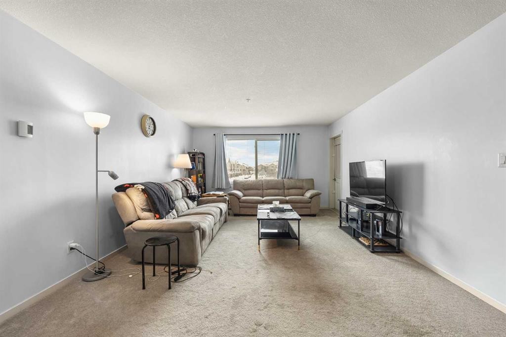 2210-181 Skyview Ranch Manor Ne, Calgary, AB - Indoor Photo Showing Living Room