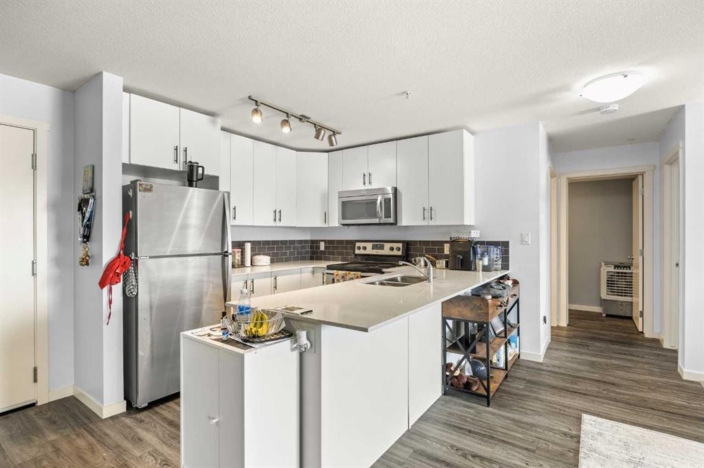 2210-181 Skyview Ranch Manor Ne, Calgary, AB - Indoor Photo Showing Kitchen With Stainless Steel Kitchen With Double Sink