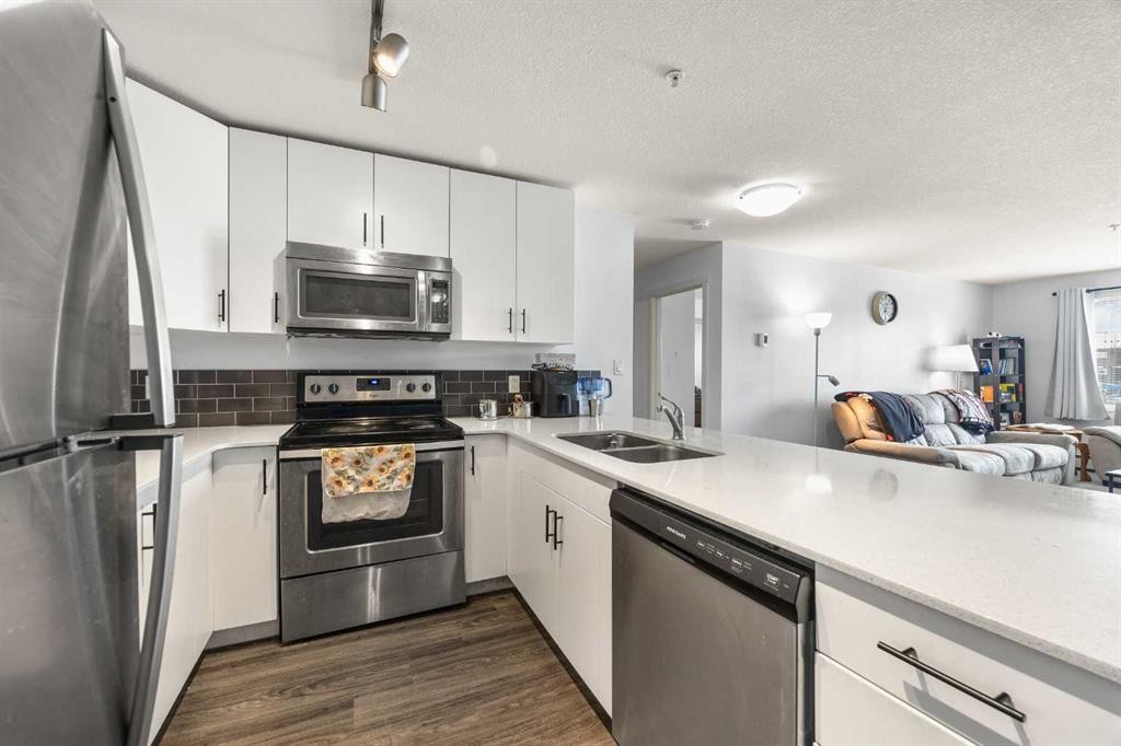 2210-181 Skyview Ranch Manor Ne, Calgary, AB - Indoor Photo Showing Kitchen With Stainless Steel Kitchen With Double Sink