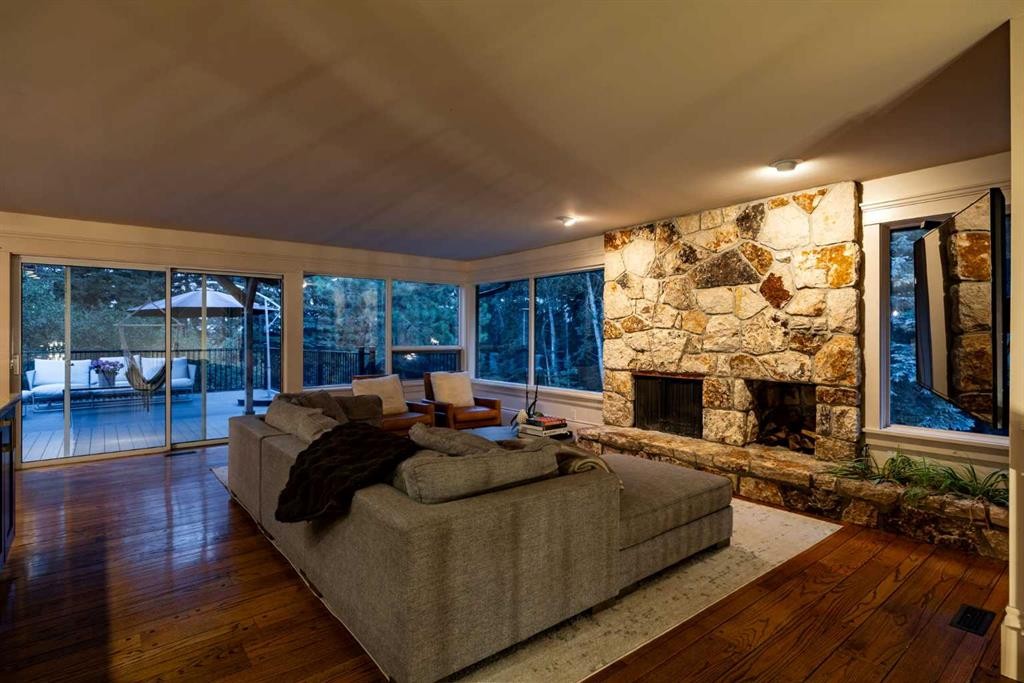 15 Elbow River Point, Rural Rocky View County, AB - Indoor With Fireplace