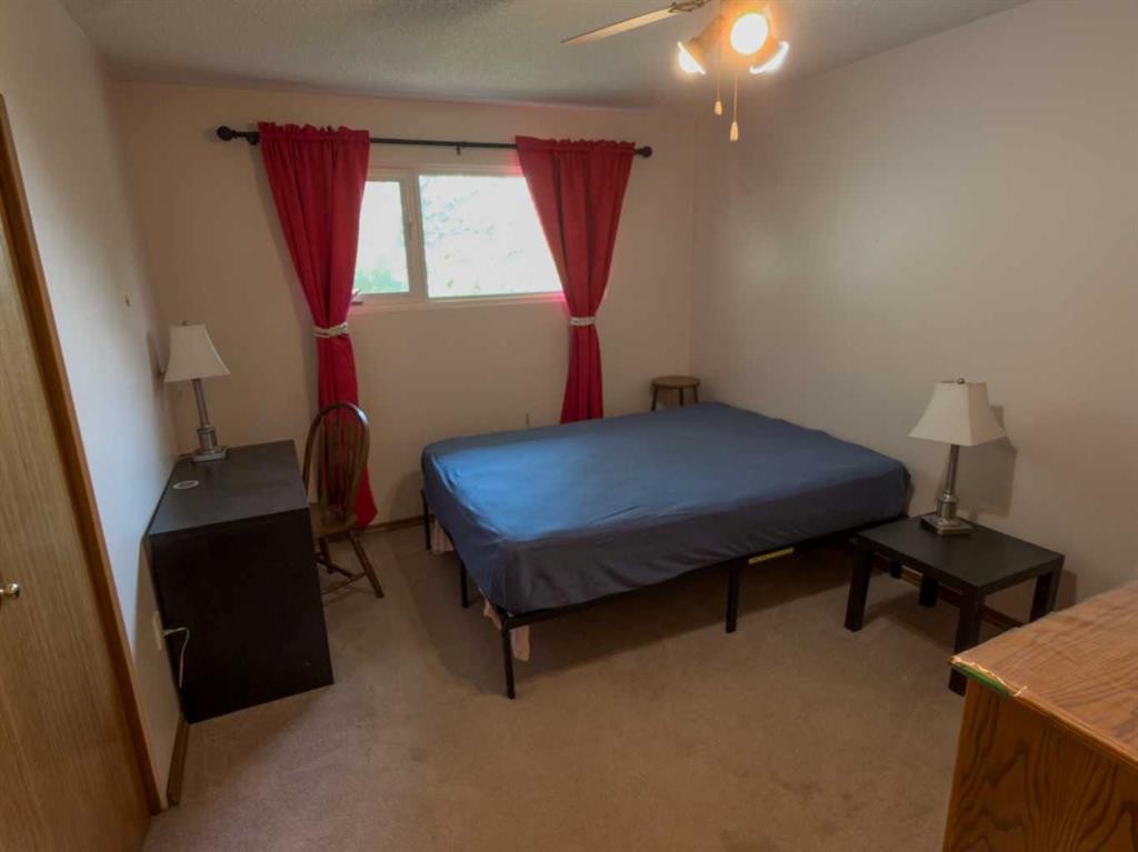 283036 Range Road 202, Rural Kneehill County, AB - Indoor Photo Showing Bedroom