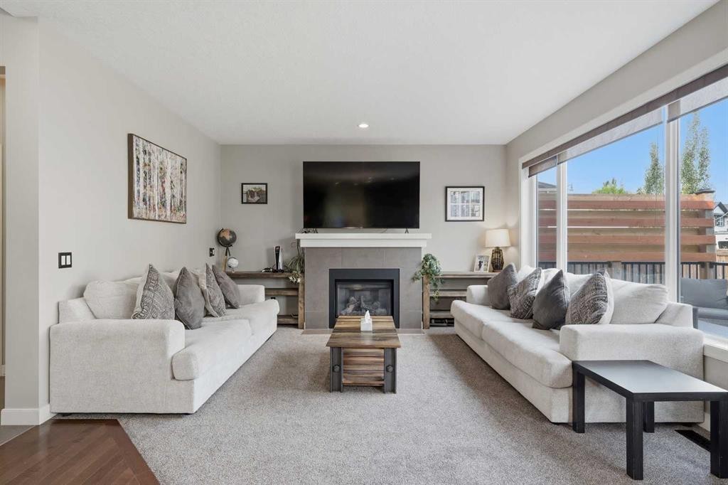 4 Drake Landing Gate, Okotoks, AB - Indoor Photo Showing Living Room With Fireplace