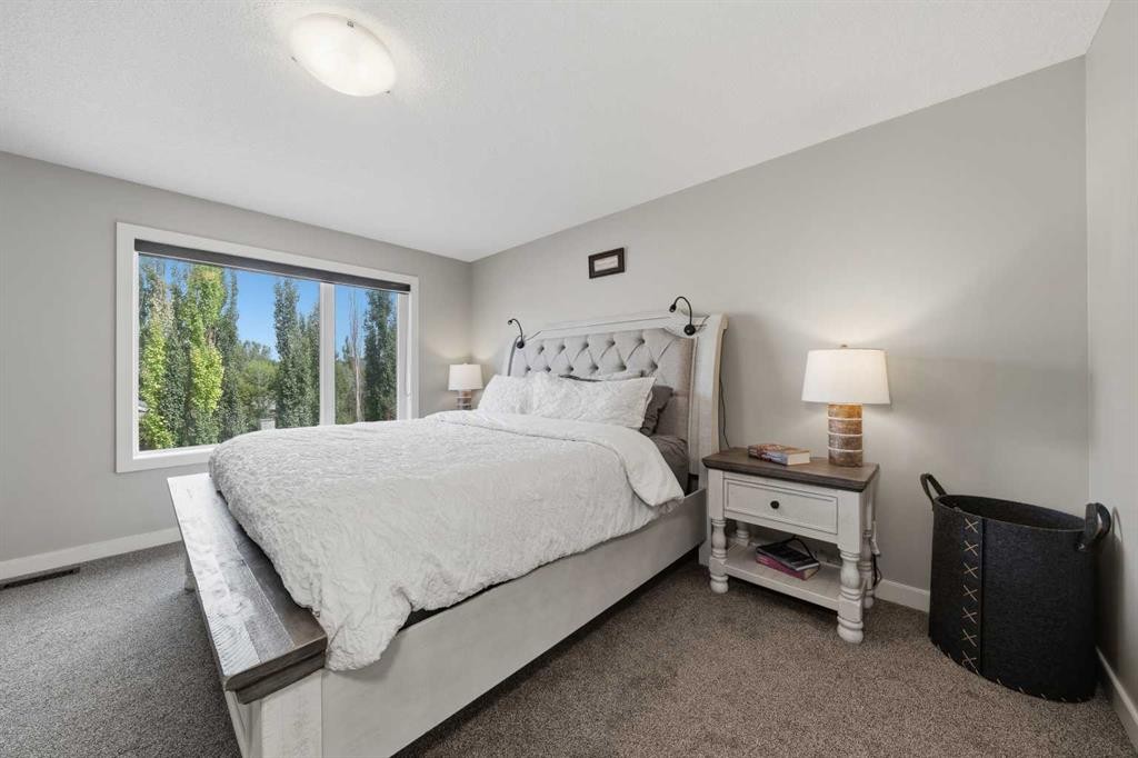 4 Drake Landing Gate, Okotoks, AB - Indoor Photo Showing Bedroom