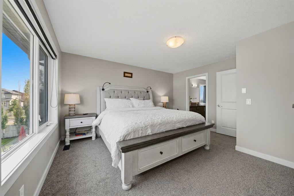 4 Drake Landing Gate, Okotoks, AB - Indoor Photo Showing Bedroom