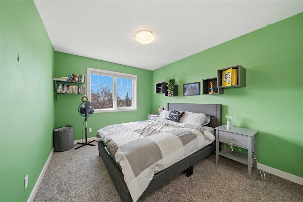 4 Drake Landing Gate, Okotoks, AB - Indoor Photo Showing Bedroom
