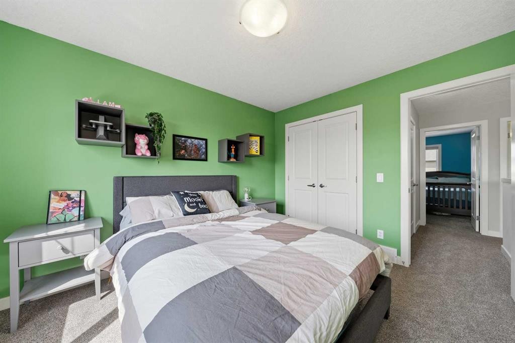 4 Drake Landing Gate, Okotoks, AB - Indoor Photo Showing Bedroom