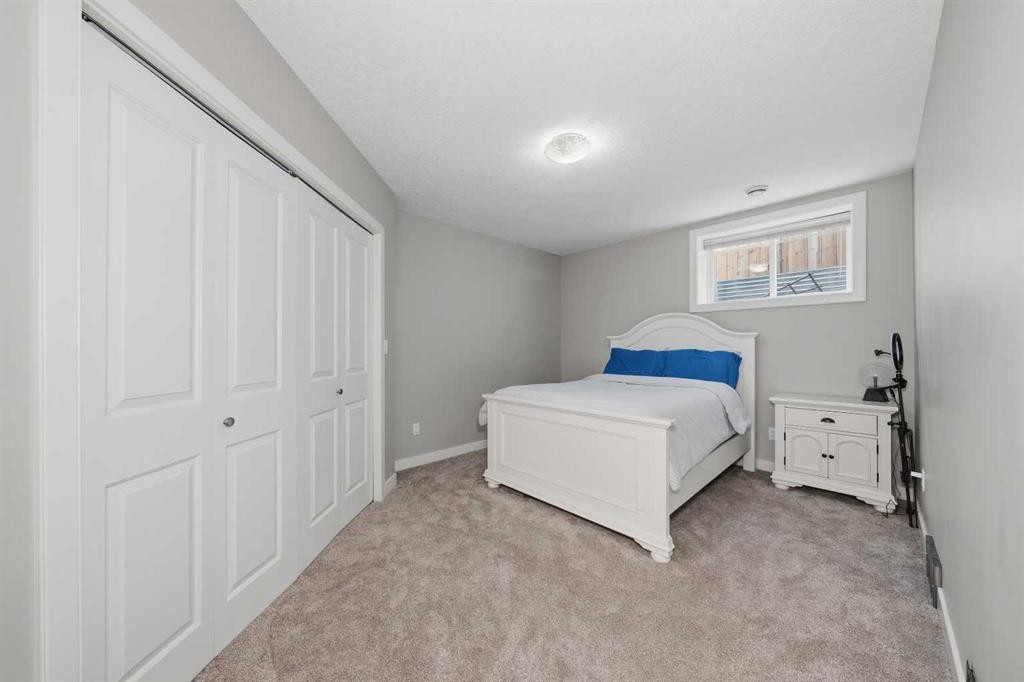 4 Drake Landing Gate, Okotoks, AB - Indoor Photo Showing Bedroom