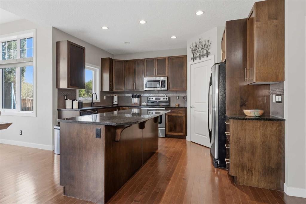 4 Drake Landing Gate, Okotoks, AB - Indoor Photo Showing Kitchen With Stainless Steel Kitchen