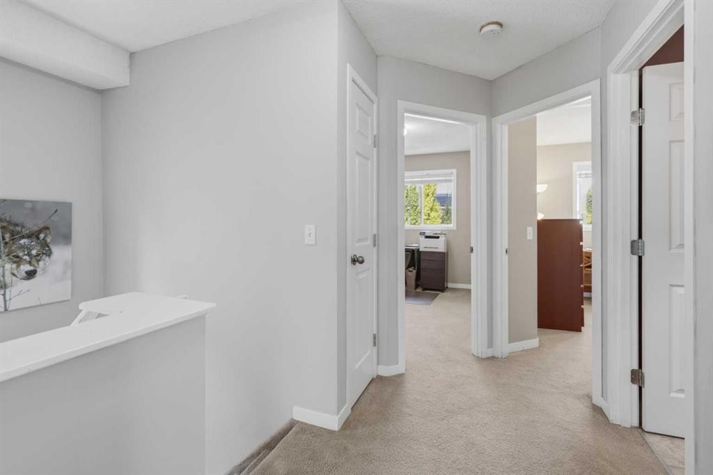 140 Hidden Point Nw, Calgary, AB - Indoor Photo Showing Other Room