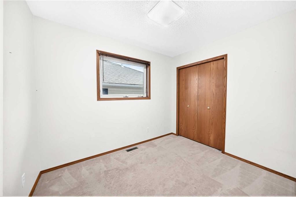 396 Hawkstone Drive Nw, Calgary, AB - Indoor Photo Showing Other Room