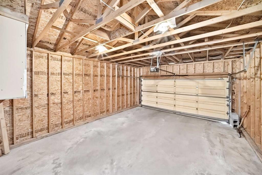 396 Hawkstone Drive Nw, Calgary, AB - Indoor Photo Showing Garage