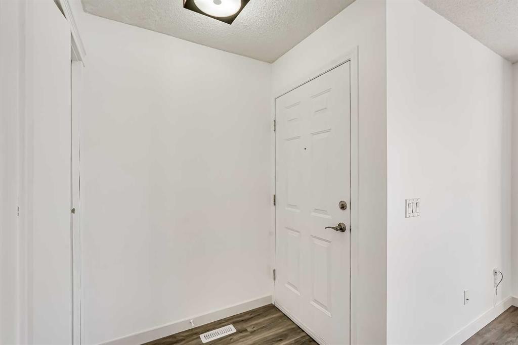 163 Saddlemont Crescent Ne, Calgary, AB - Indoor Photo Showing Other Room
