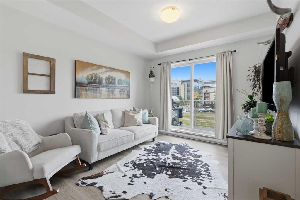 413-20 Seton Park Se, Calgary, AB - Indoor Photo Showing Living Room