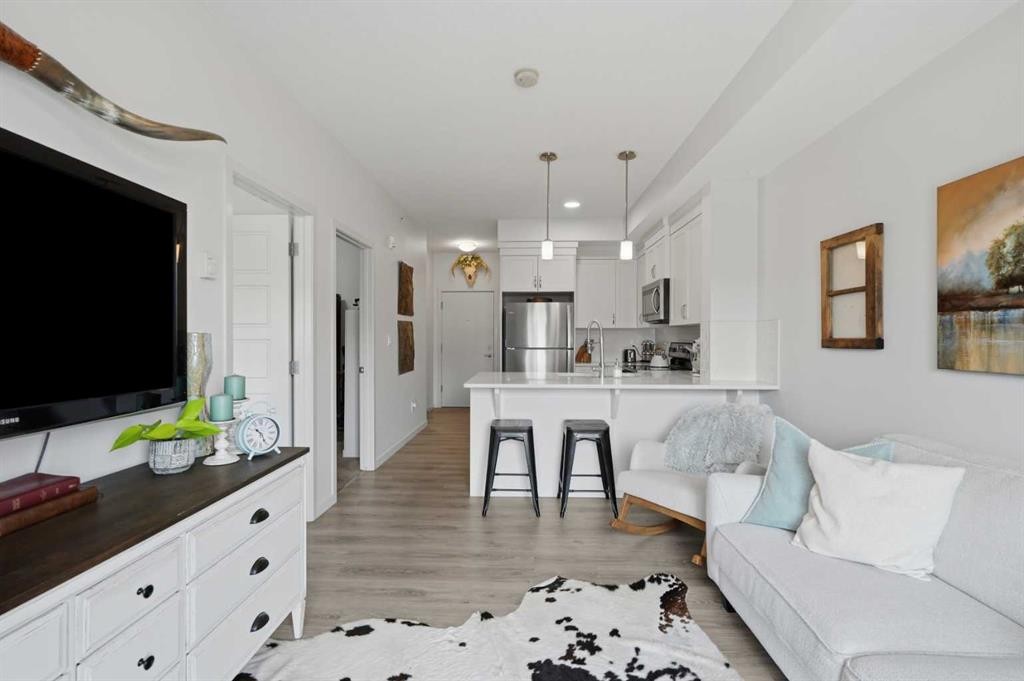 413-20 Seton Park Se, Calgary, AB - Indoor Photo Showing Living Room