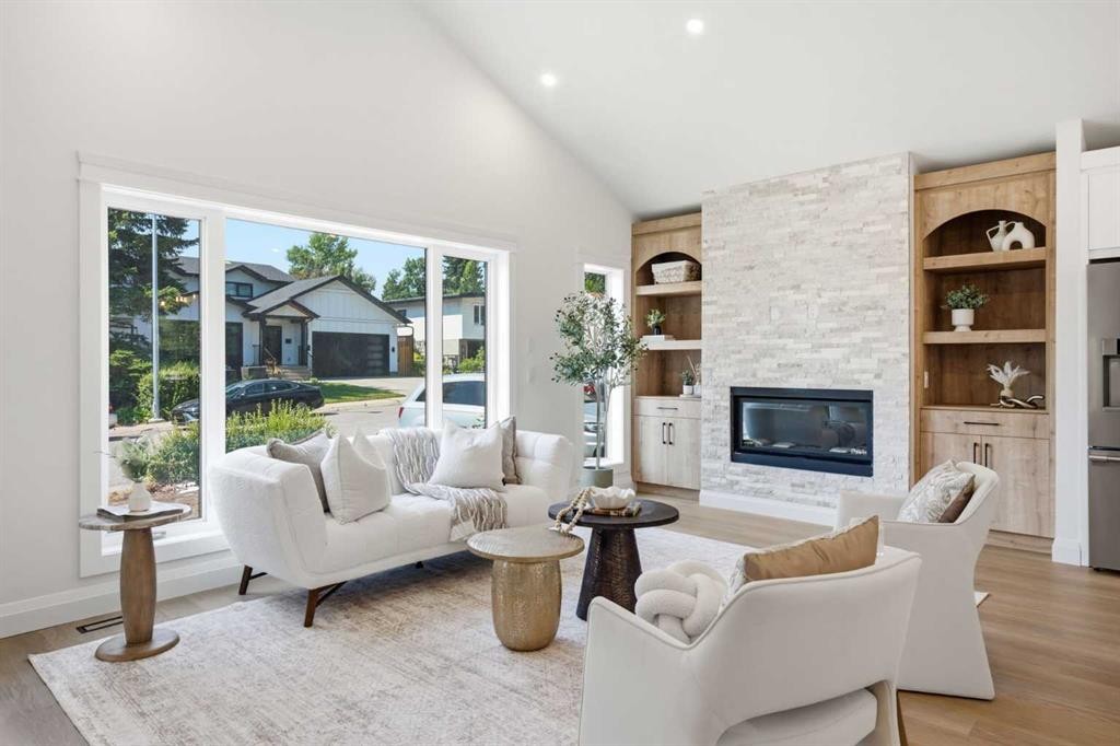 3375 Breton Close Nw, Calgary, AB - Indoor Photo Showing Living Room With Fireplace