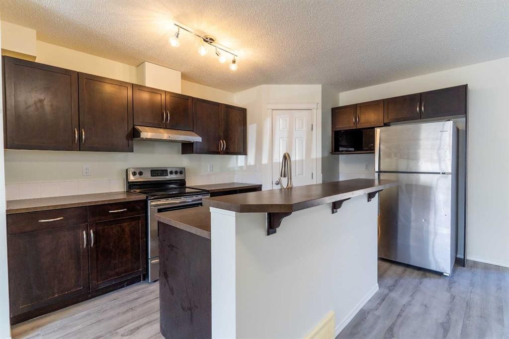 157 Country Village Manor Ne, Calgary, AB - Indoor Photo Showing Kitchen With Stainless Steel Kitchen