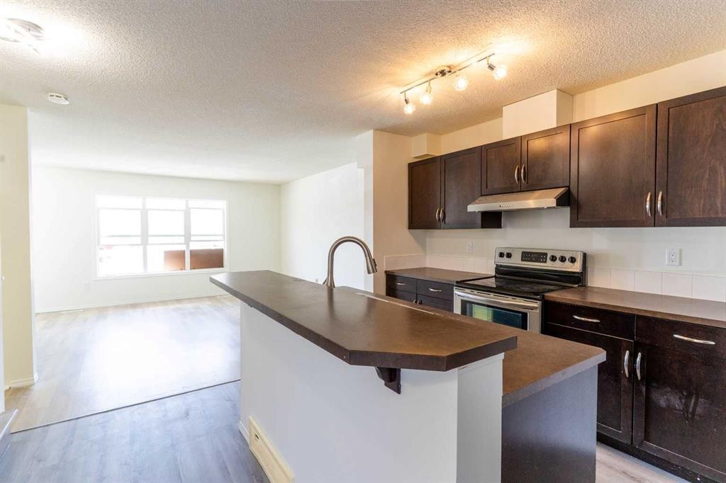 157 Country Village Manor Ne, Calgary, AB - Indoor Photo Showing Kitchen With Double Sink