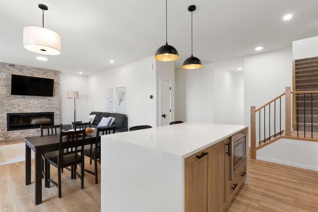 18 Southwinds Link Sw, Airdrie, AB - Indoor With Fireplace