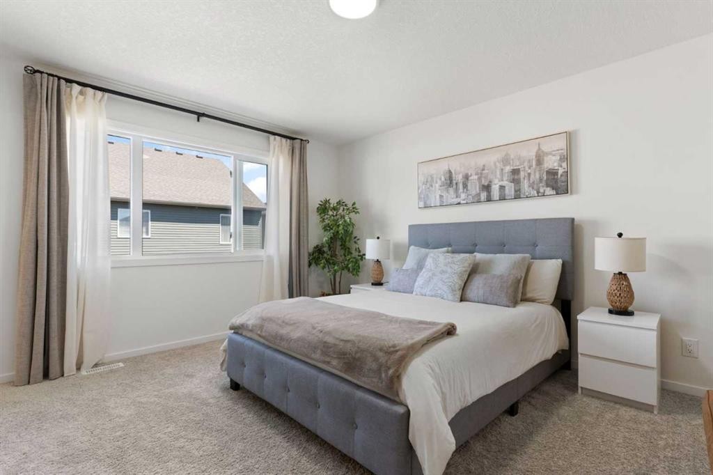 18 Southwinds Link Sw, Airdrie, AB - Indoor Photo Showing Bedroom