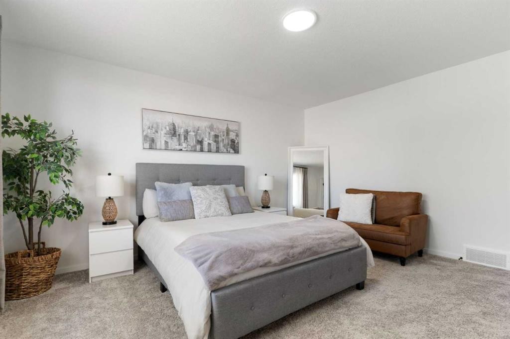 18 Southwinds Link Sw, Airdrie, AB - Indoor Photo Showing Bedroom