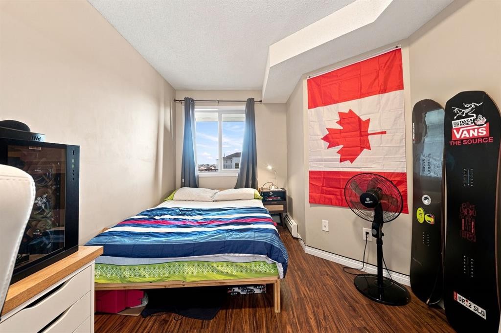 413-7210 80 Avenue Ne, Calgary, AB - Indoor Photo Showing Bedroom