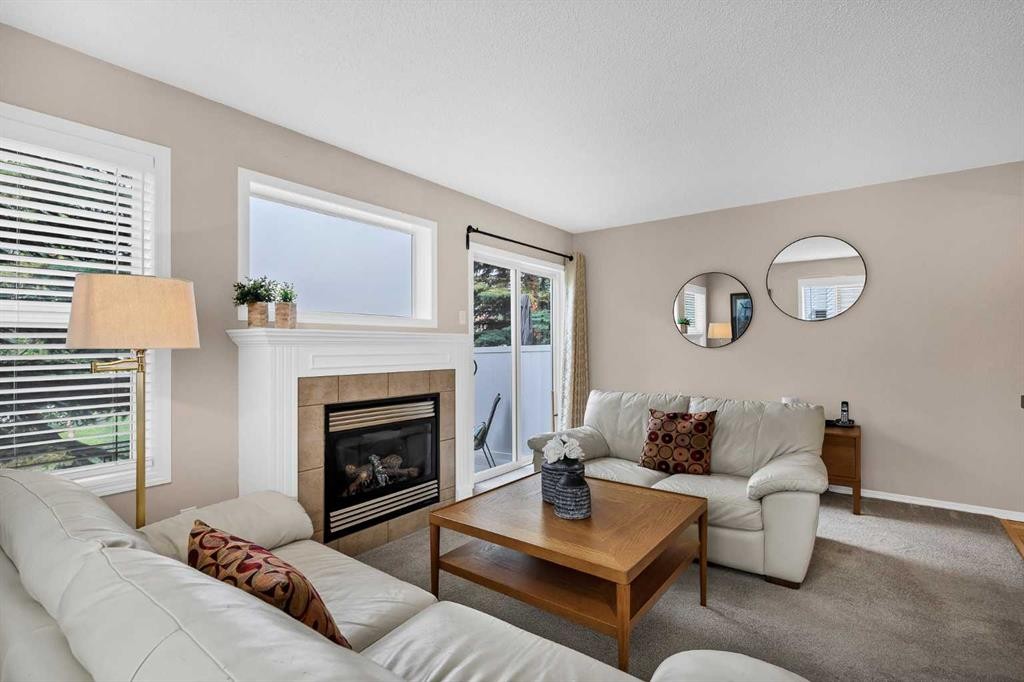 17 Country Village Circle Ne, Calgary, AB - Indoor Photo Showing Living Room With Fireplace