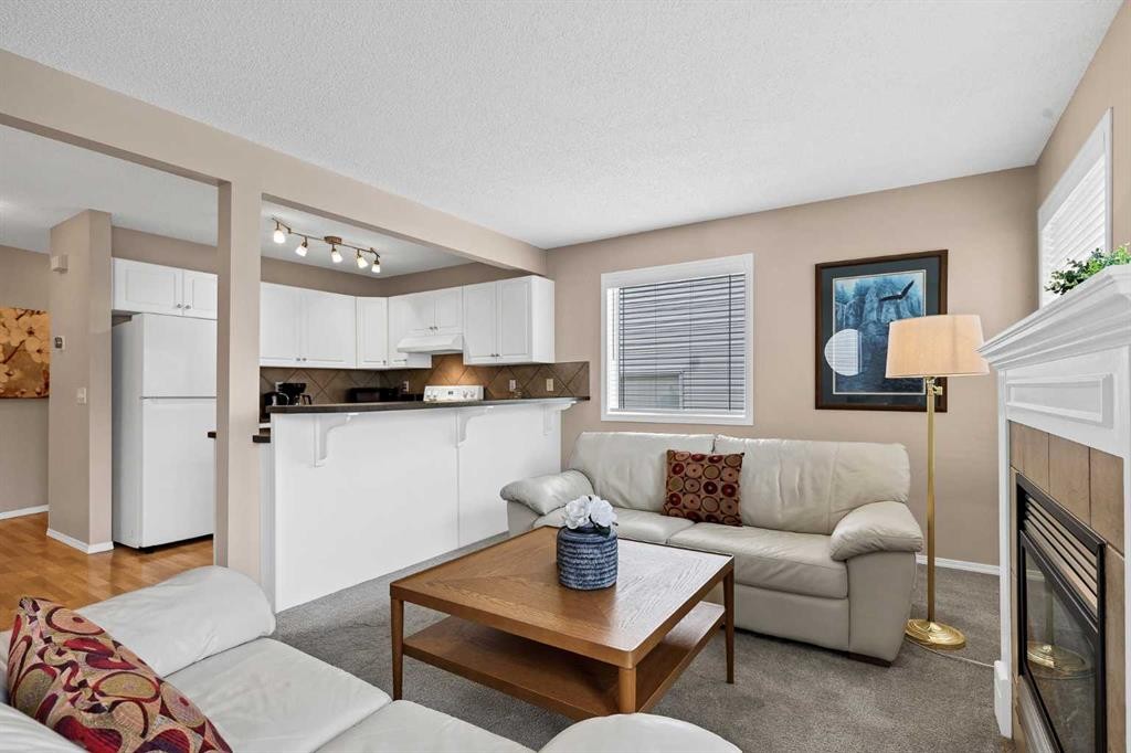 17 Country Village Circle Ne, Calgary, AB - Indoor Photo Showing Living Room With Fireplace