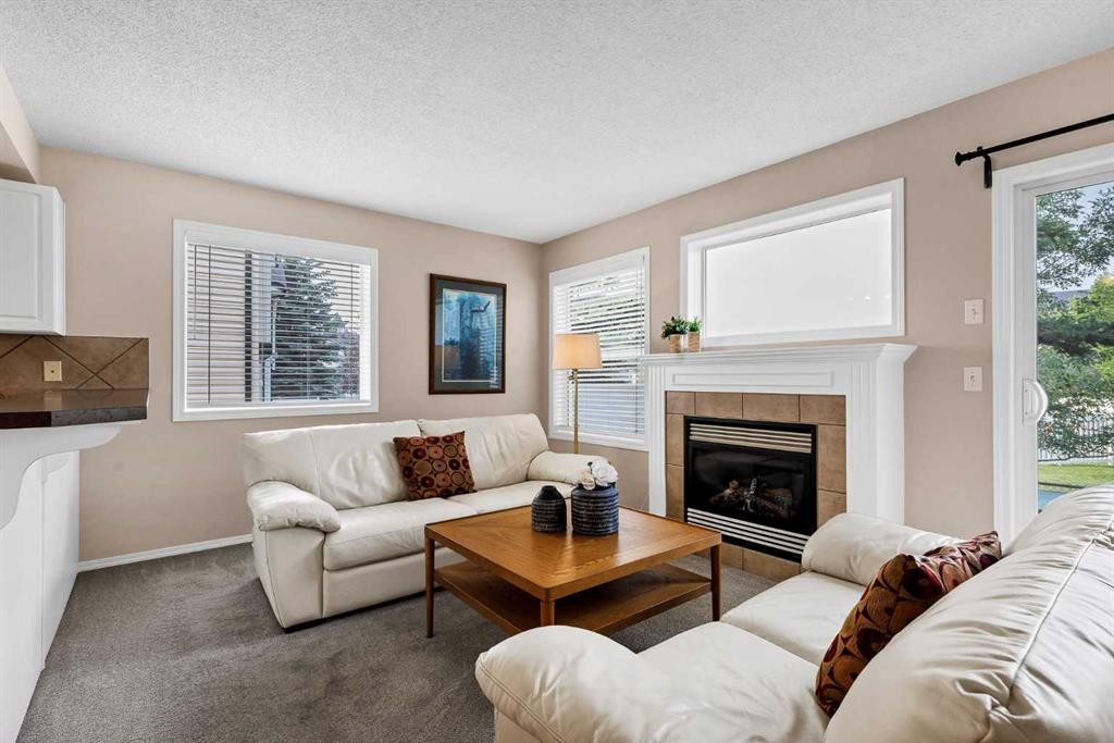 17 Country Village Circle Ne, Calgary, AB - Indoor Photo Showing Living Room With Fireplace