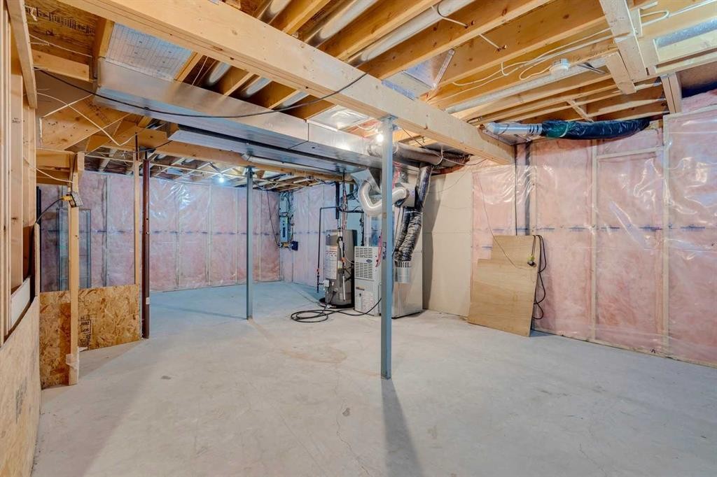25 Coville Gardens Ne, Calgary, AB - Indoor Photo Showing Basement