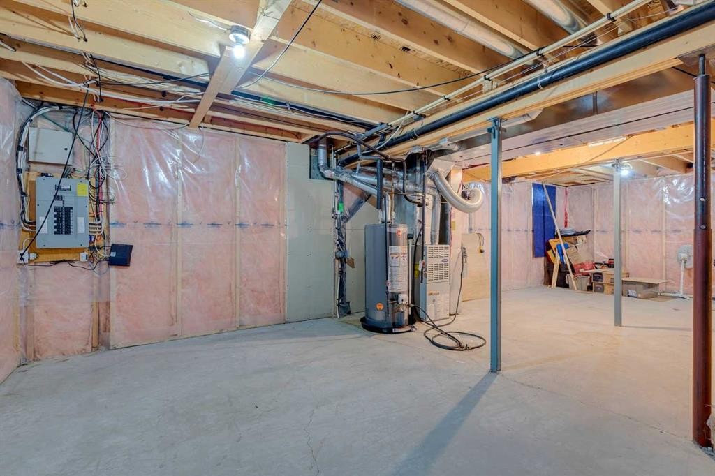 25 Coville Gardens Ne, Calgary, AB - Indoor Photo Showing Basement