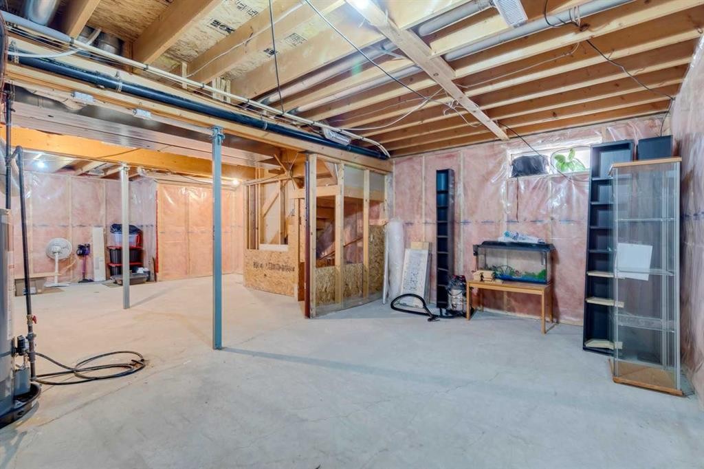 25 Coville Gardens Ne, Calgary, AB - Indoor Photo Showing Basement