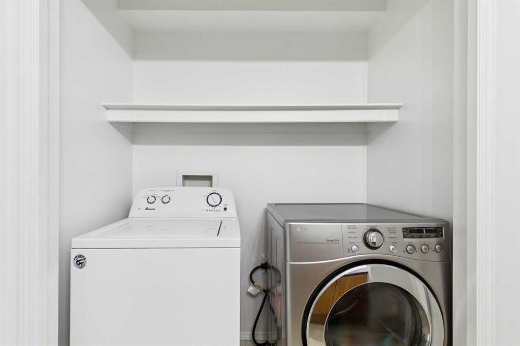 25 Coville Gardens Ne, Calgary, AB - Indoor Photo Showing Laundry Room