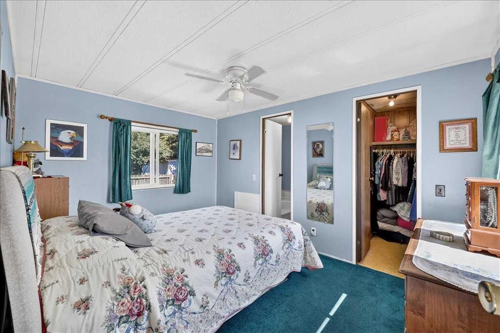 88 Big Hill Way Se, Airdrie, AB - Indoor Photo Showing Bedroom