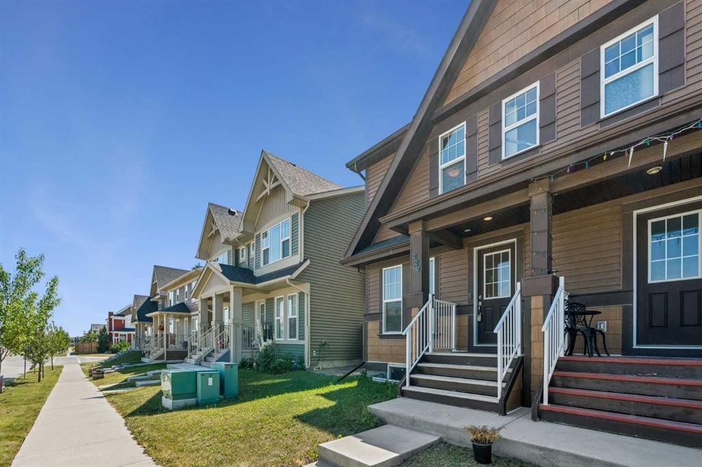 229 Fireside Drive, Cochrane, AB - Outdoor With Deck Patio Veranda With Facade