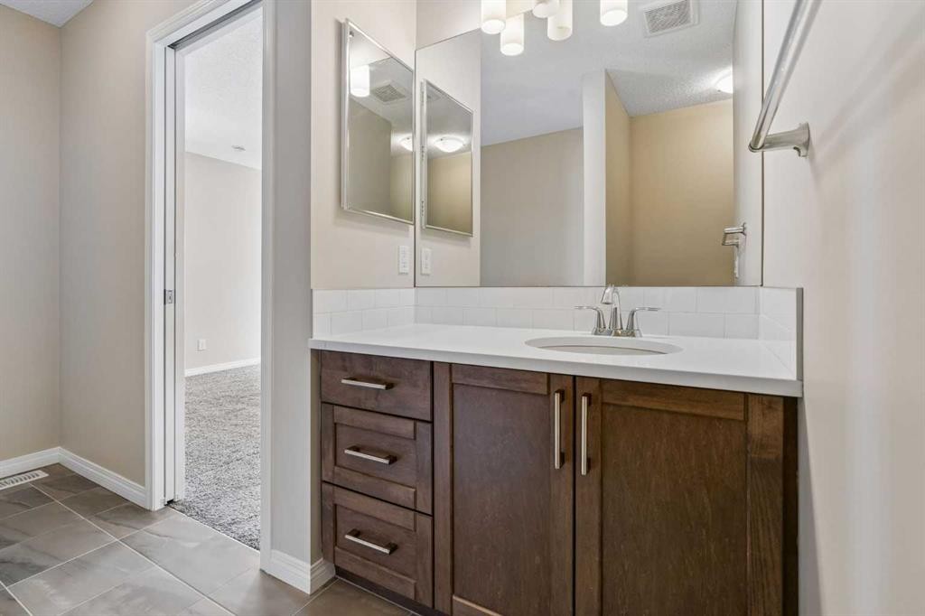 229 Fireside Drive, Cochrane, AB - Indoor Photo Showing Bathroom