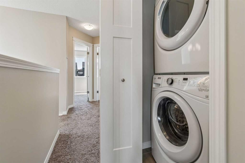229 Fireside Drive, Cochrane, AB - Indoor Photo Showing Laundry Room