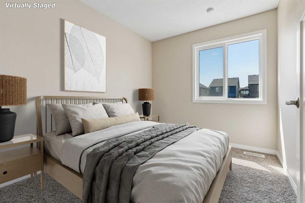 229 Fireside Drive, Cochrane, AB - Indoor Photo Showing Bedroom