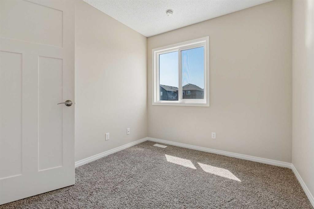 229 Fireside Drive, Cochrane, AB - Indoor Photo Showing Other Room