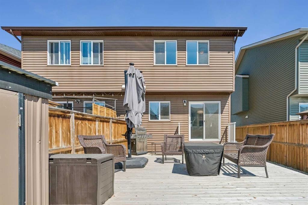 229 Fireside Drive, Cochrane, AB - Outdoor With Deck Patio Veranda With Exterior