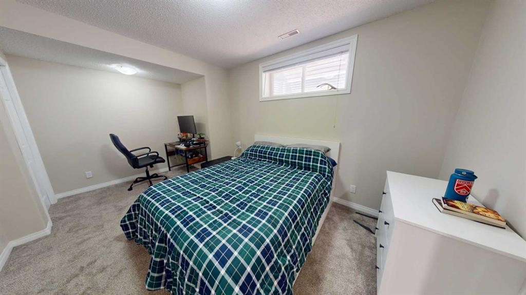 47 Chapman Circle Se, Calgary, AB - Indoor Photo Showing Bedroom