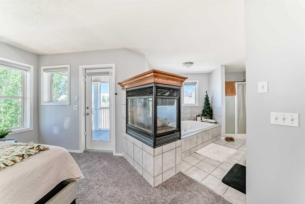 382 Cove Road, Chestermere, AB - Indoor Photo Showing Bedroom