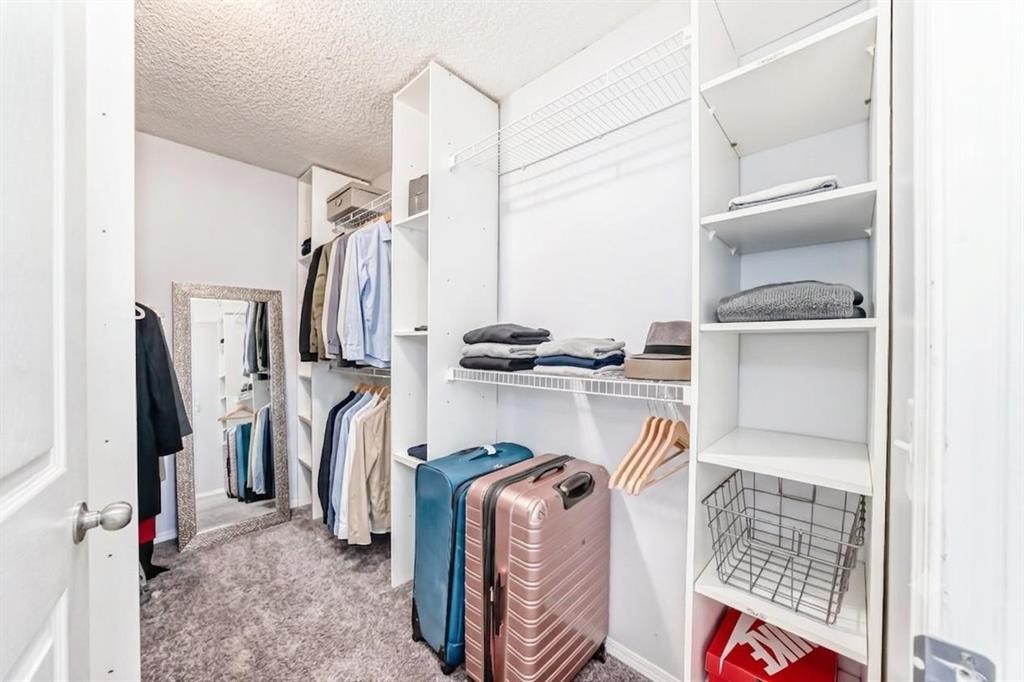 382 Cove Road, Chestermere, AB - Indoor With Storage